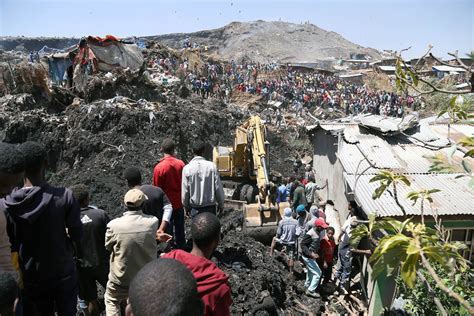 cleaning mud Ethiopia|Landslide at rubbish dump near Addis .